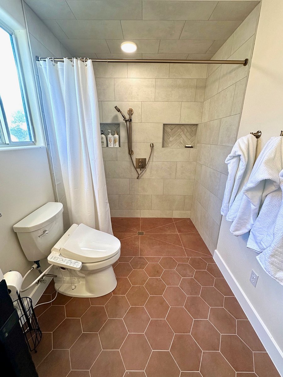 Master Bathroom roll in shower. Double headed shower. 