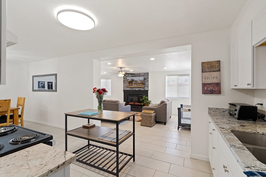 Looking from kitchen into the Den with electric fireplace/heater 