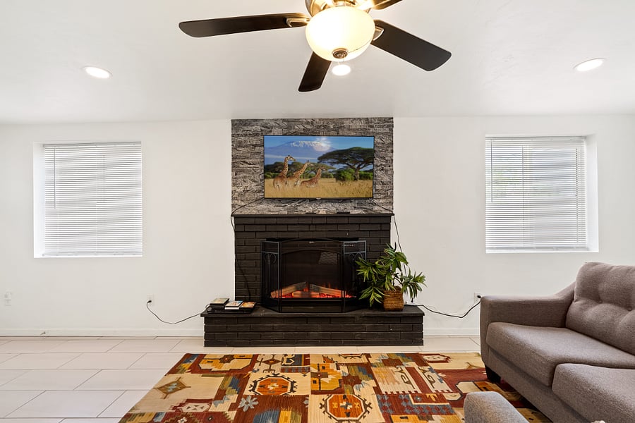 TV and fireplace in the den.  Cozy with or without fireplace heater. 