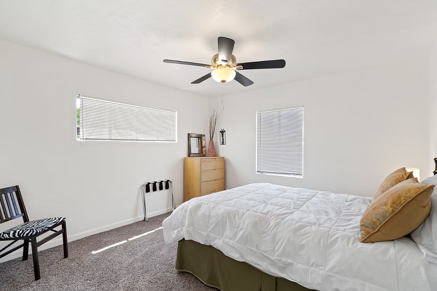 clean uncluttered rooms with space for clothing, a large closet and ceiling fan.  Bedroom #2 queen 