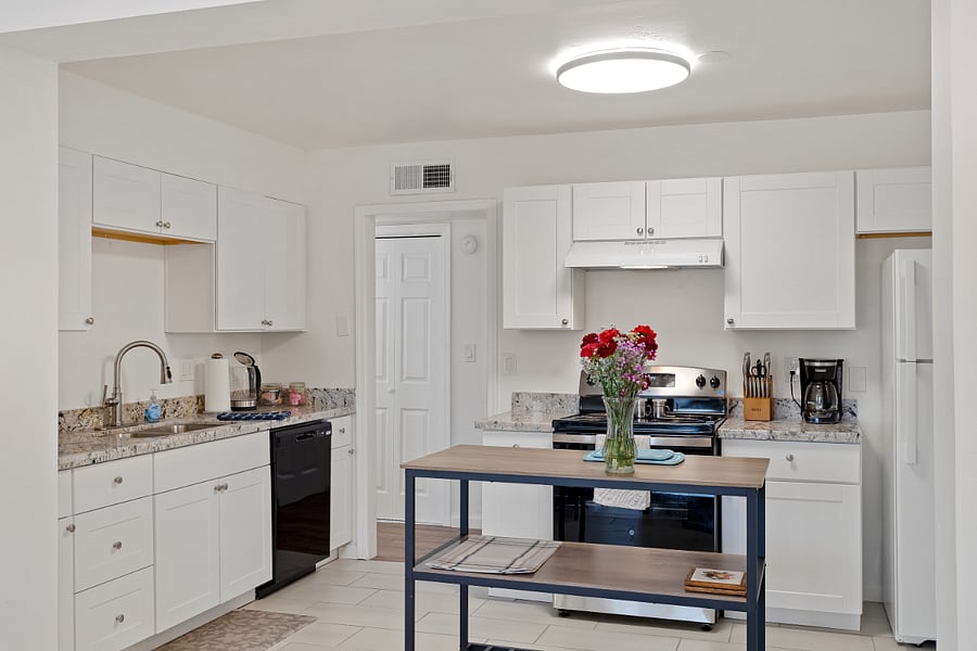 Roomie kitchen with island perfect for prepping 