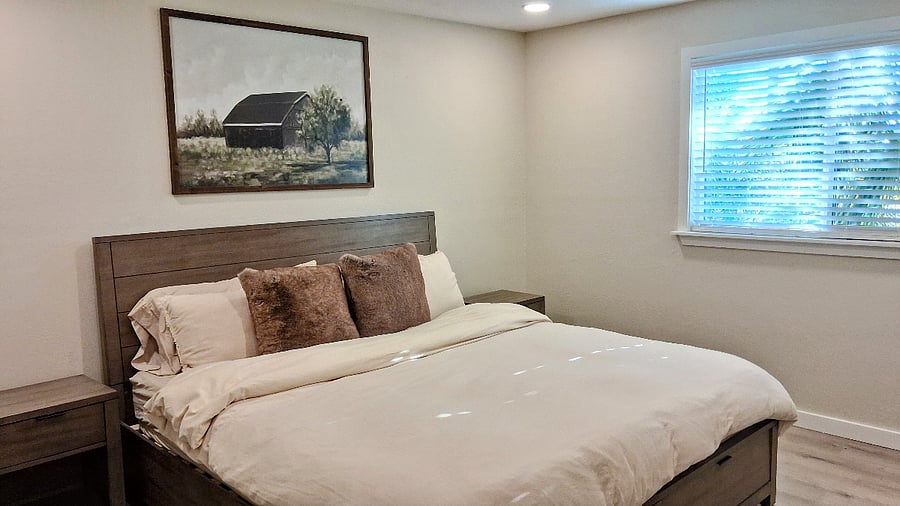 spacious bedroom with king size bed