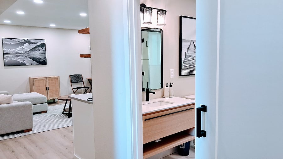 sliding barn door to this beautiful bathroom