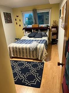 Bedroom 1 with queen, full-size closet (not pictured in this photo)