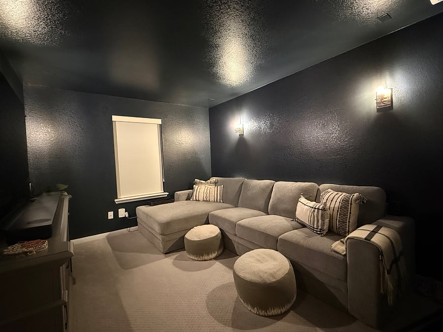 The private media room offers a theater-like experienceperfect for movie nights and relaxing after a long day.