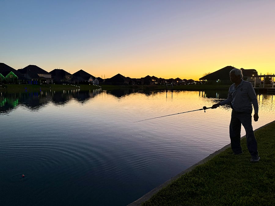 End the day watching the sunset while fishing in the backyard.