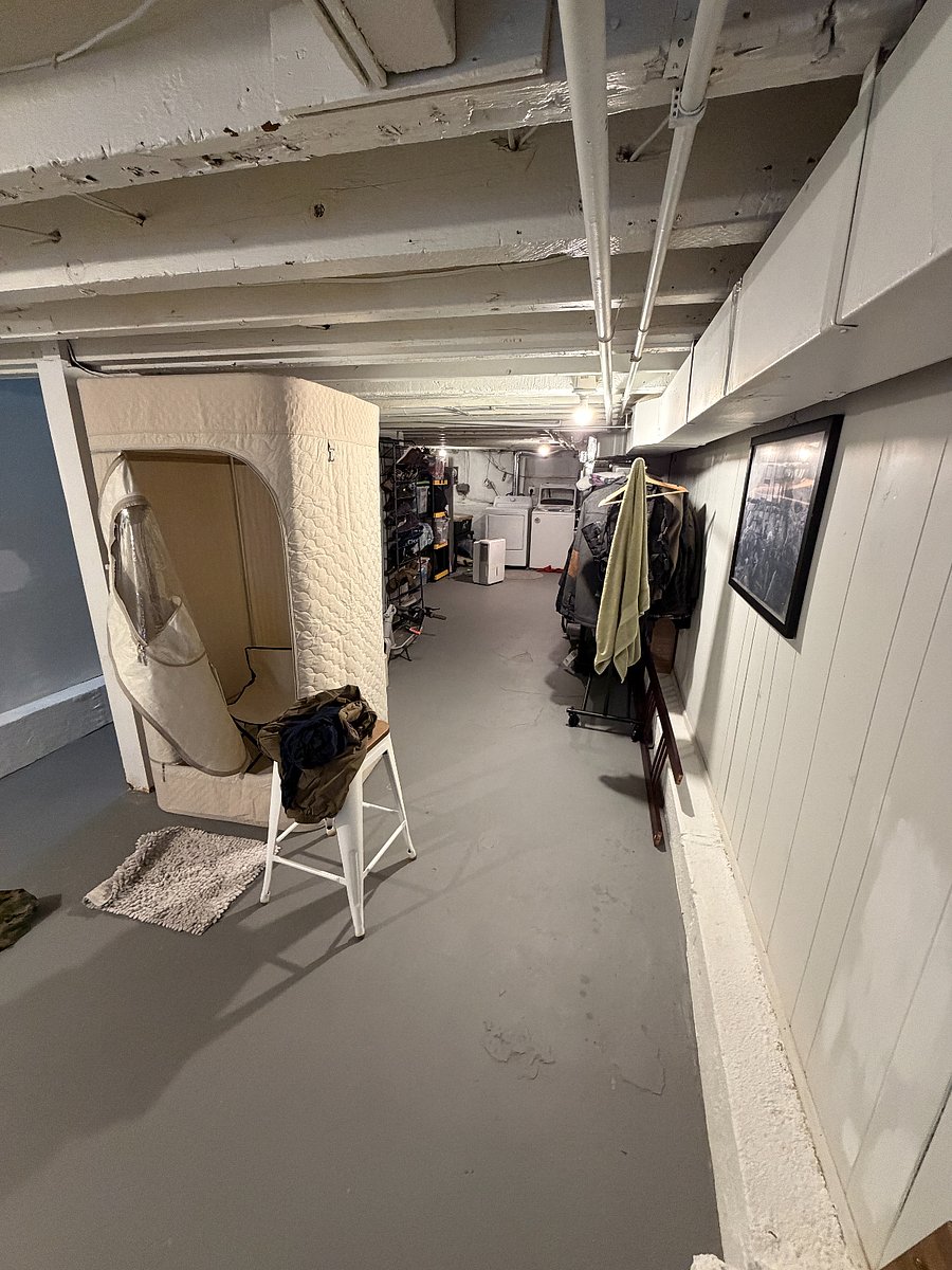 basement is large with ample room for storage. Laundry units at the back of the room. Tent sauna also included.