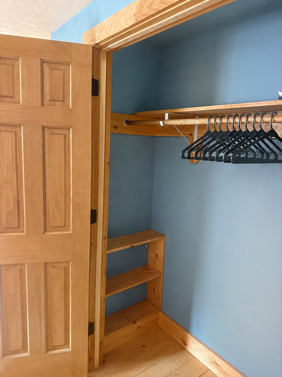 Left-side shelves in closet for Bedroom #2 (interior of upstairs bedroom closet)