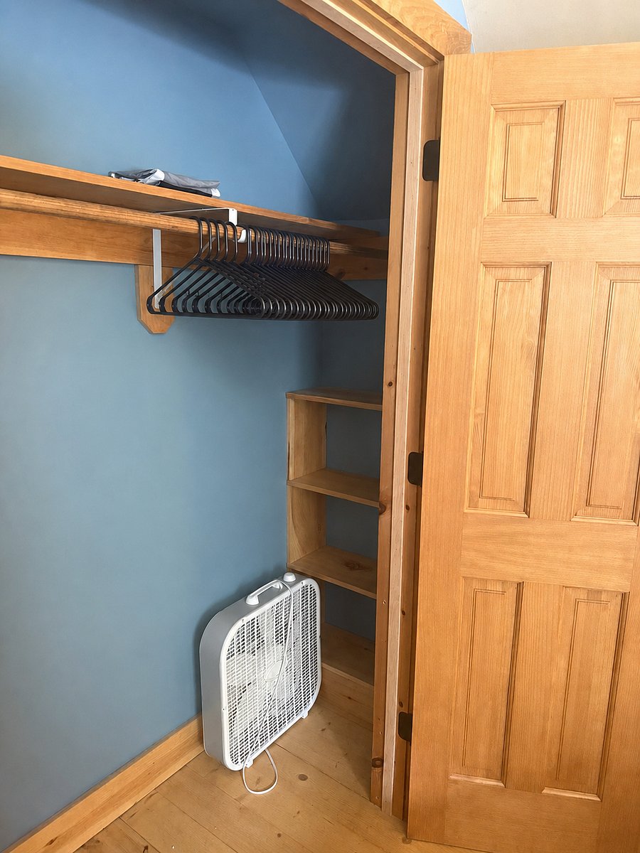 Right-side shelves in closet for Bedroom #2 (interior of upstairs bedroom closet)