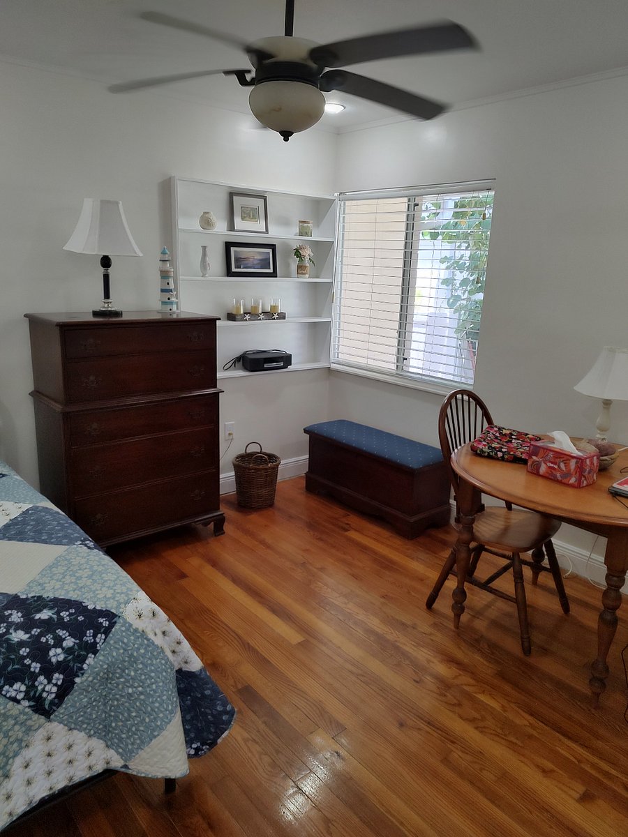 apt #1 bedroom 2 twin bed + table + shelf + window 07122026
