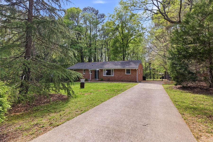 Long driveway can accommodate 2-3 cars. Street parking out front is available as well.
