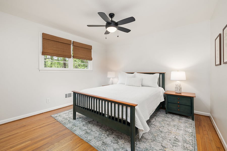 Bedroom 2 with a queen bed, nightstands, and a closet