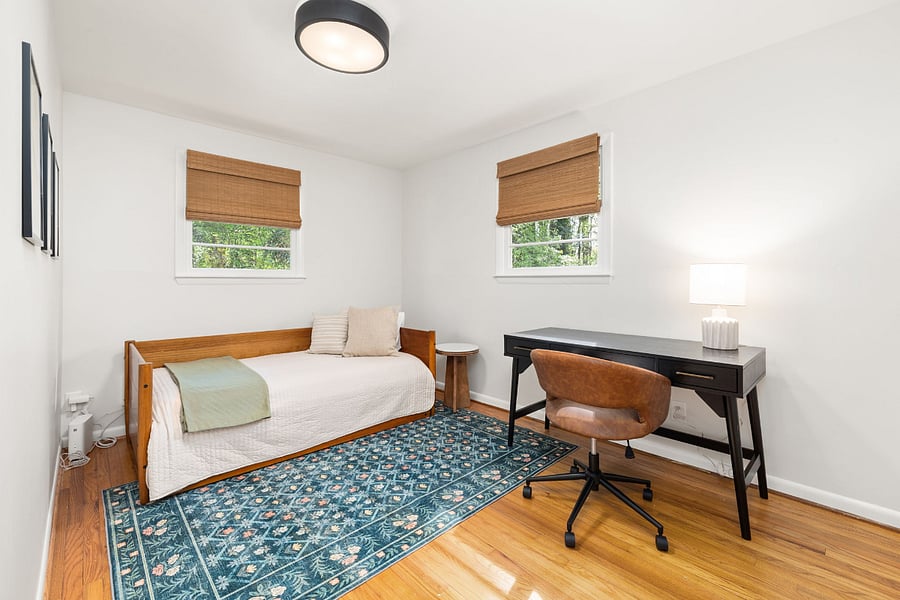 Bedroom 3 with a twin daybed (including a trundle), closet, and desk area
