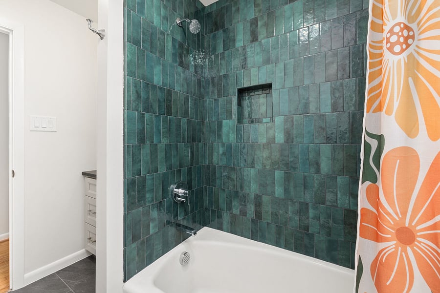 Full hall bath with bold colors and fun design features