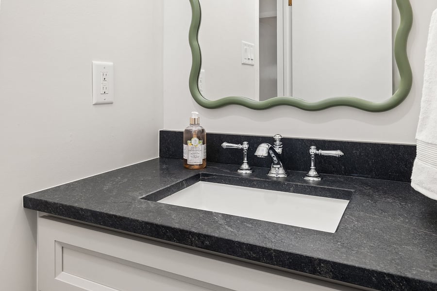 Full hall bath with bold colors and fun design features