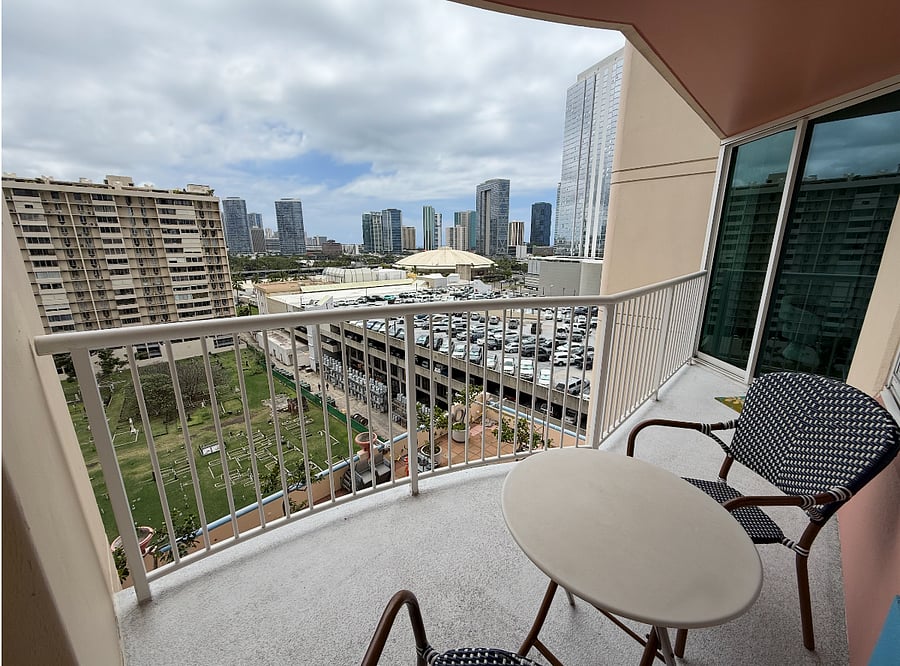 Private lanai with city, mountain, sunrise, and ocean views.