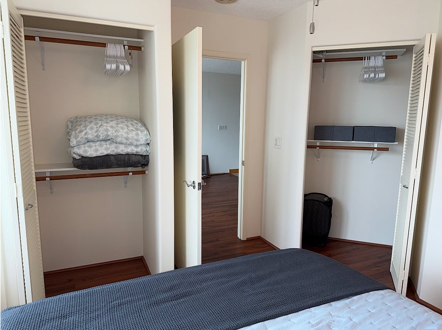 Ample closet space and storage in the bedroom.
