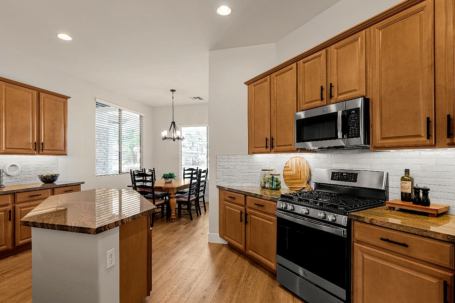 Kitchen - The open layout invites conversation, weather you're preparing a quick breakfast or a family dinner. 