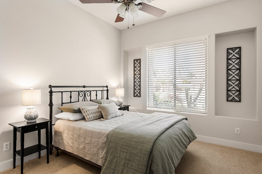 Bright and welcoming third bedroom with queen bed