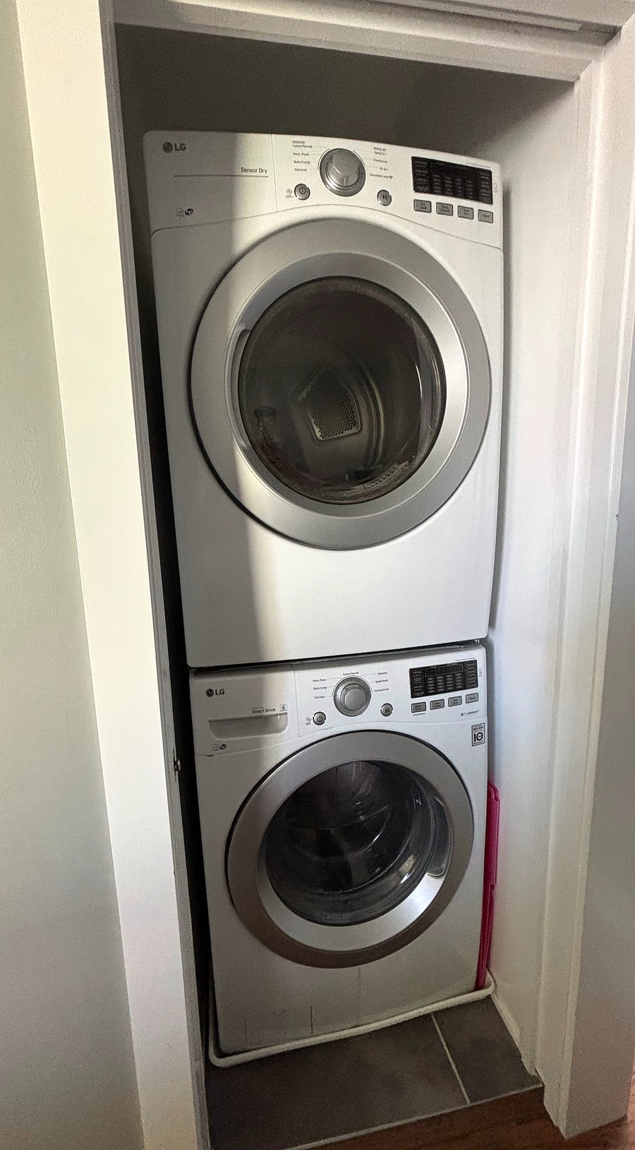 Stacking washer and dryer in unit conveniently located on the upper level with bedrooms