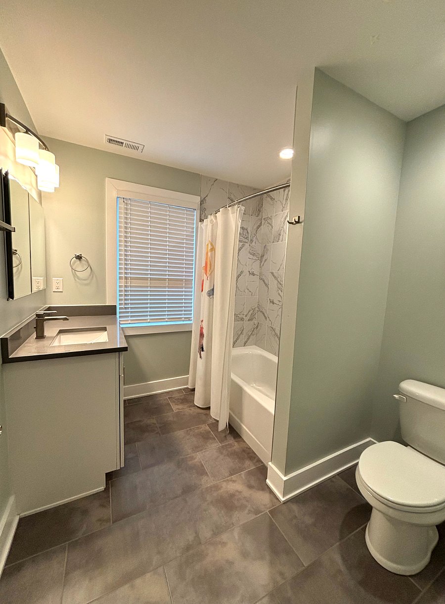 Full bathroom shared by bedrooms 2 and 3