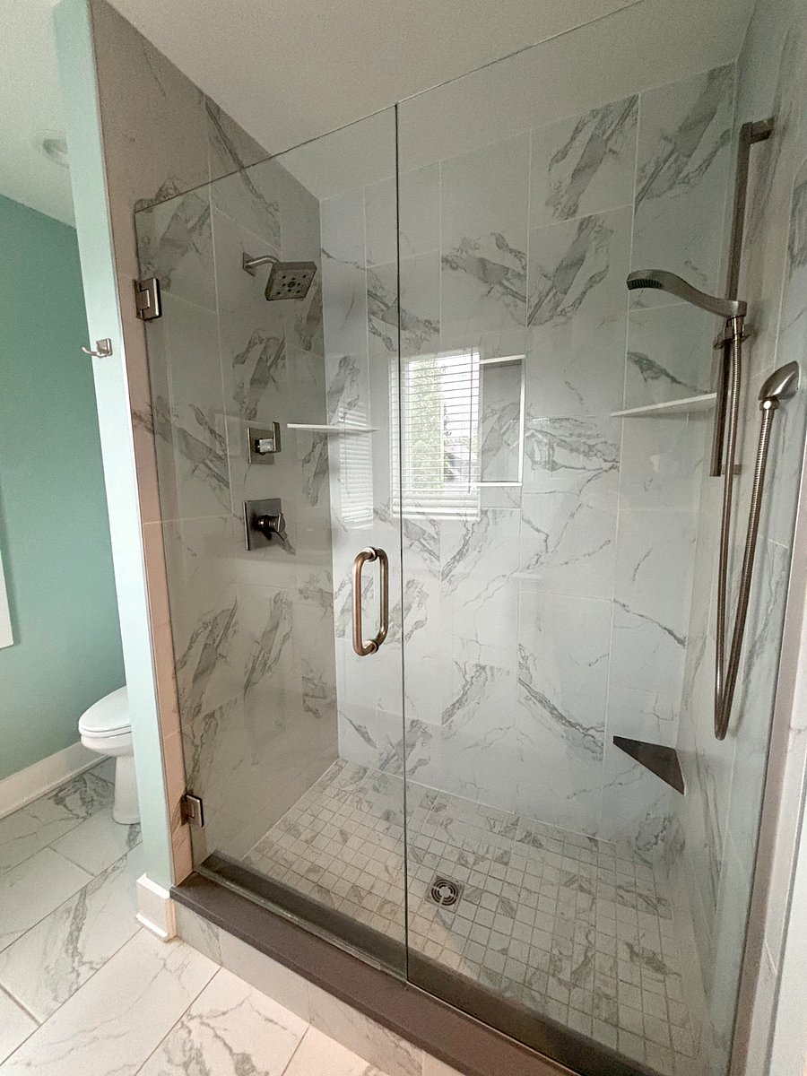 Primary bathroom has a walk-in shower that can accommodate up to two