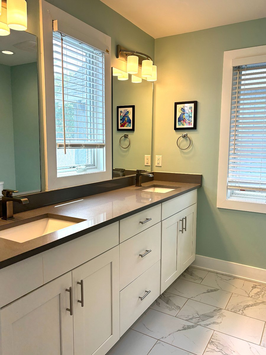 Primary bathroom with double sinks and walk-in shower