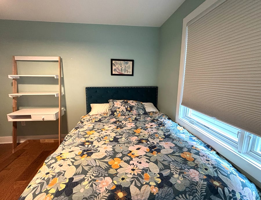 Bedroom 2 has a queen bed and a desk for working