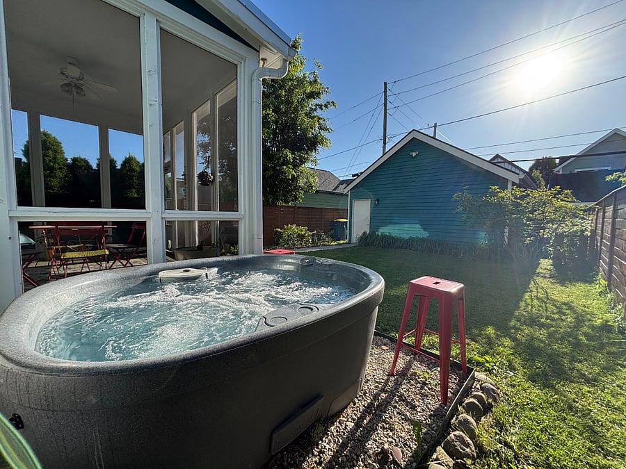 Relax and recharge in your own private hot tub spacious enough for 5