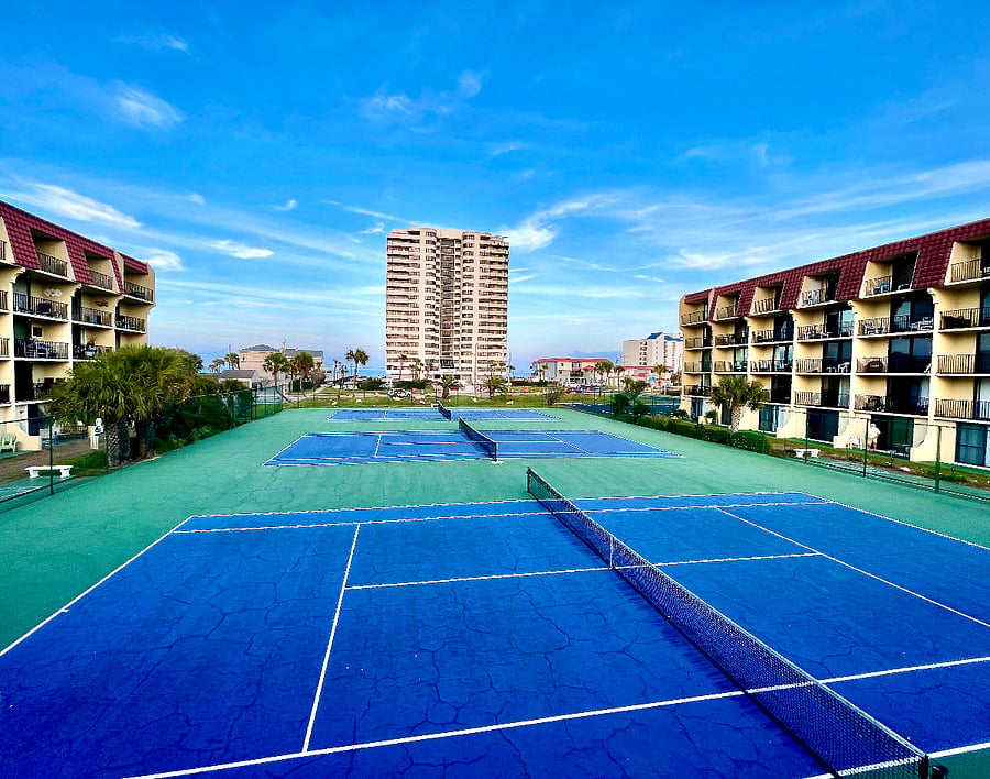 Tennis and pickleball courts with open coastal surroundings