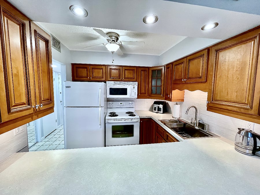 Fully equipped kitchen with updated finishes and everyday essentials