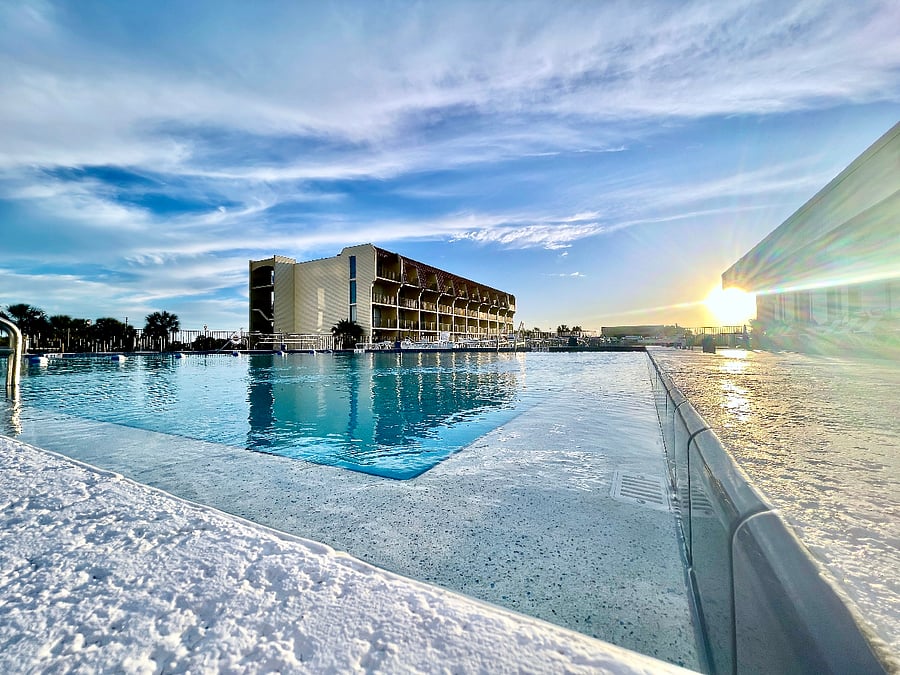 Enjoy peaceful evenings by the pool at sunset