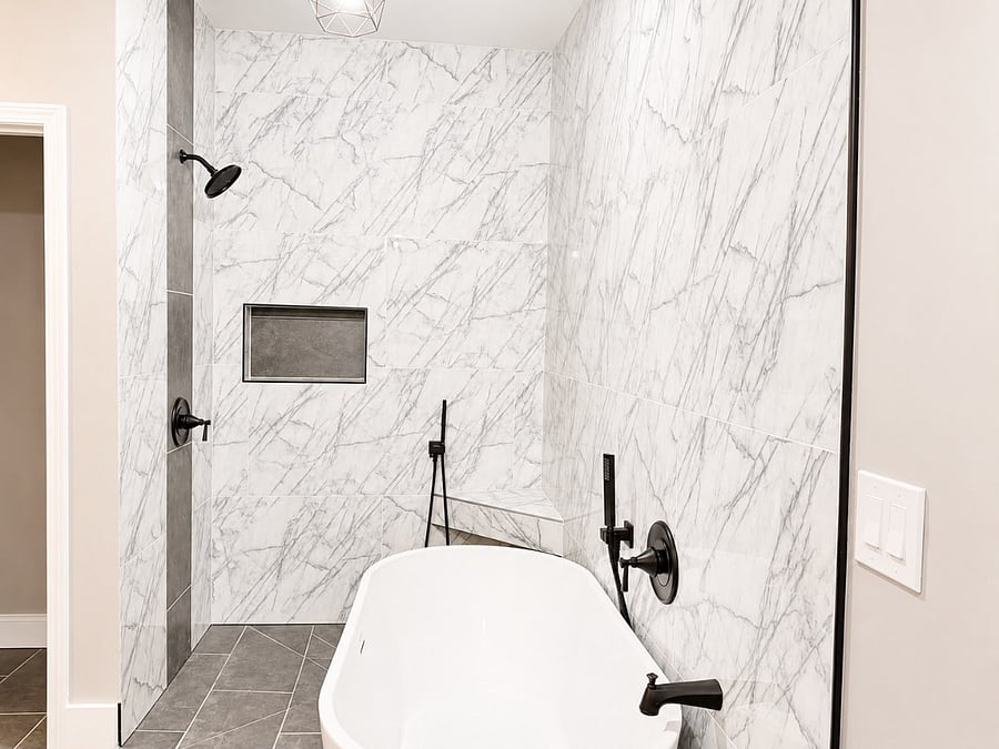 A spa-style bath,  marble accents and room to actually relax.