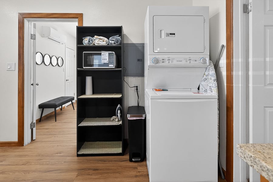 stackable washer and dryer in the unit.