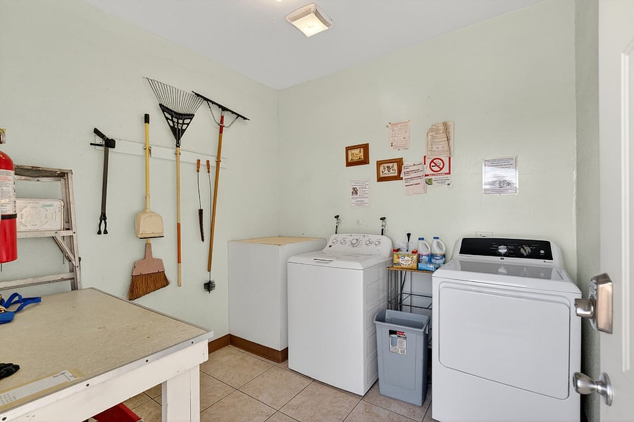 The community laundry room is equipped with a full washer and dryer, free for your use, making longer stays easy and convenient.