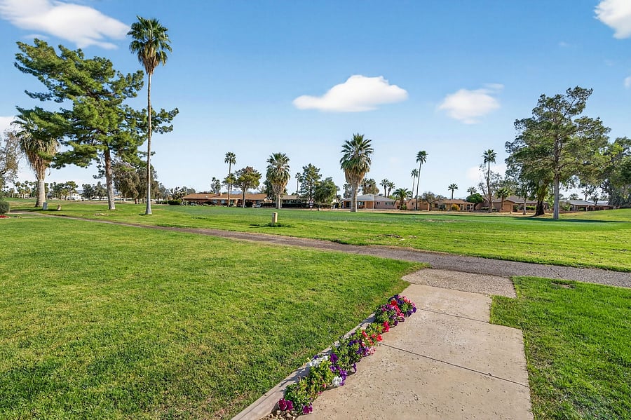 Step outside to the beautiful patio overlooking the courtyard, with access to the fairway and walking path. Perfect for morning coffee with the Arizona sunrise or dinner on the grill under the open sky.