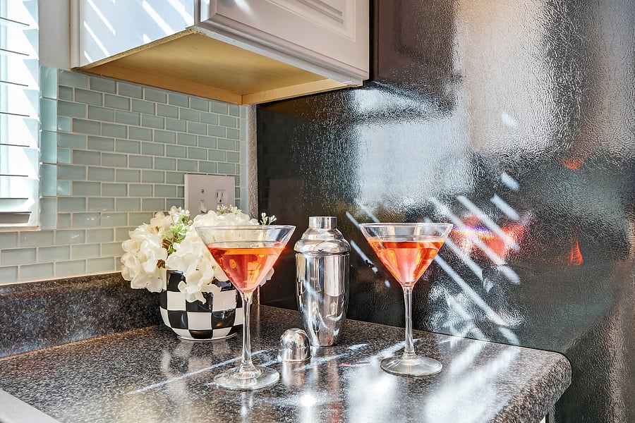 Two chilled martinis waiting in elegant glasses, shaker at the readybecause vacation mode deserves a little sparkle and a perfectly crafted sip. Cheers to sunset views, good company, and cocktails done right.