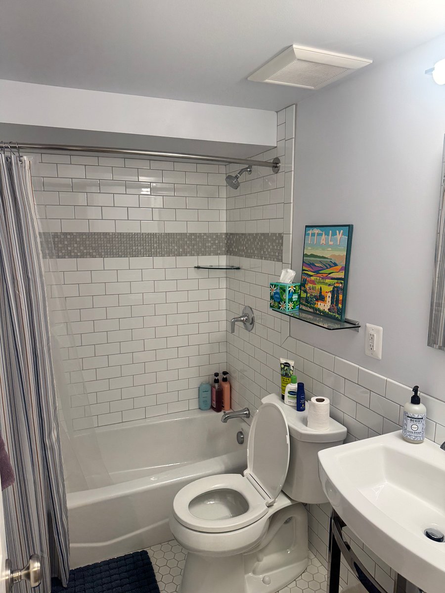 Full bathroom (in between living room and kitchen)