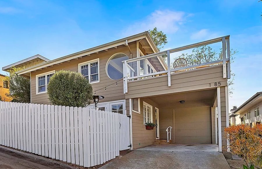 Front of house showing carport and street parking