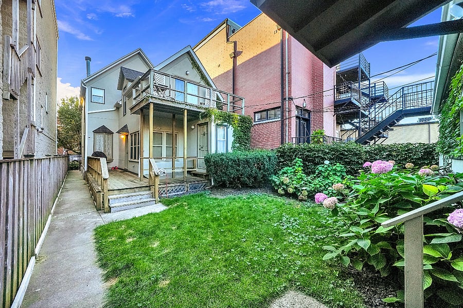 private fenced back yard and deck
