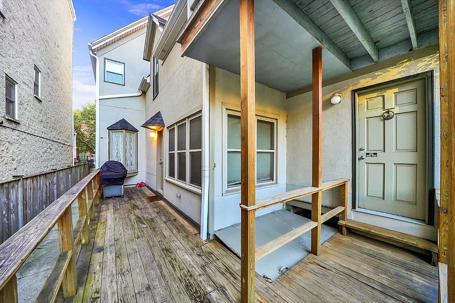 private fenced back yard and deck