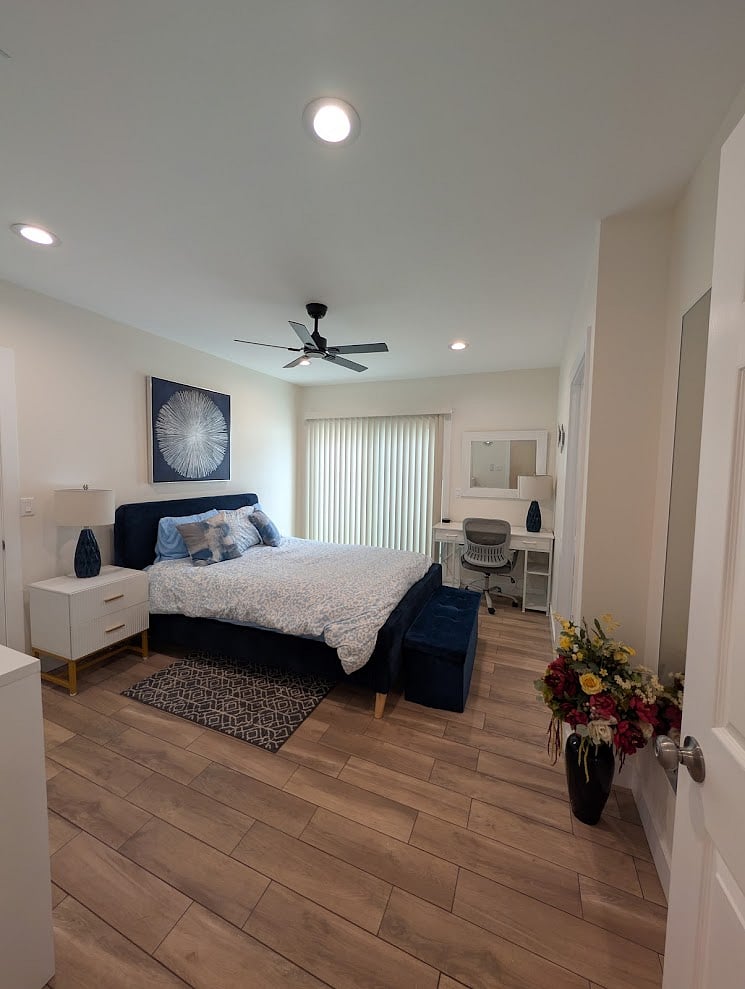 Comfortable queen bed with clean, modern design