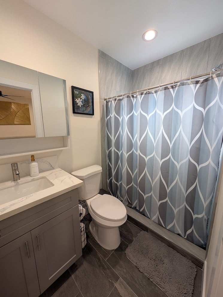 Fully updated bathroom with modern fixtures and walk-in shower