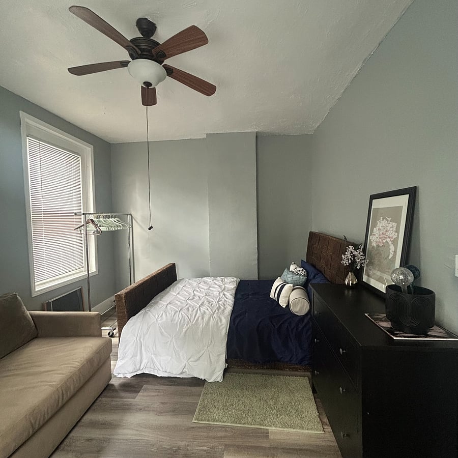 Guest bedroom (Queen Size bd) with couch and dresser. 