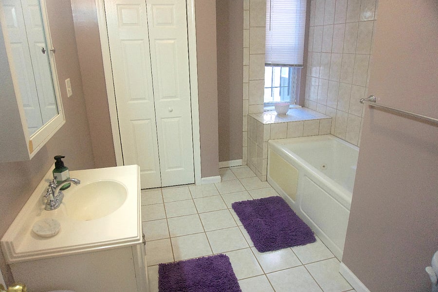 Bedroom 2 Large Bathroom w/ linen closet and large jacuzzi tub. 