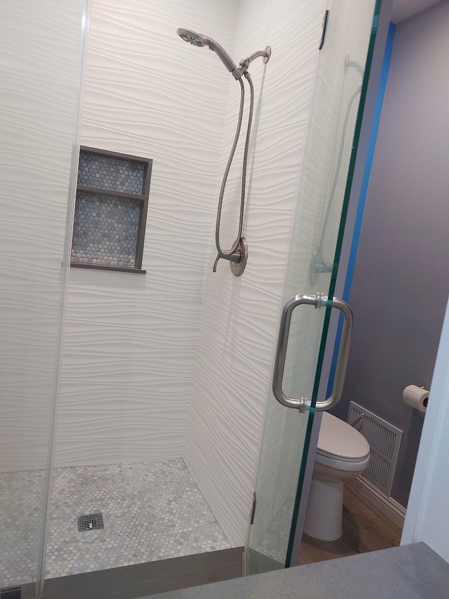 Stand-up shower in upstairs bathroom.