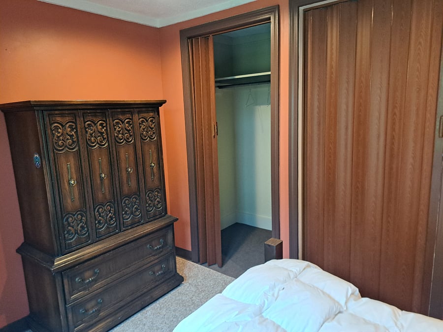 Large closet with a large shelf
