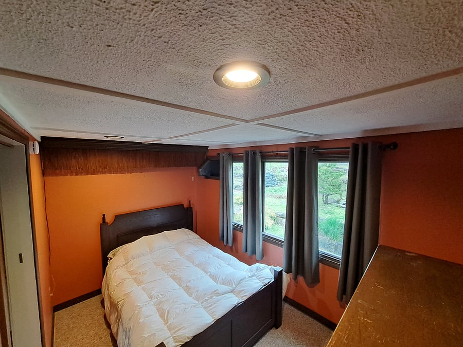 Bedroom with room darkening drapes