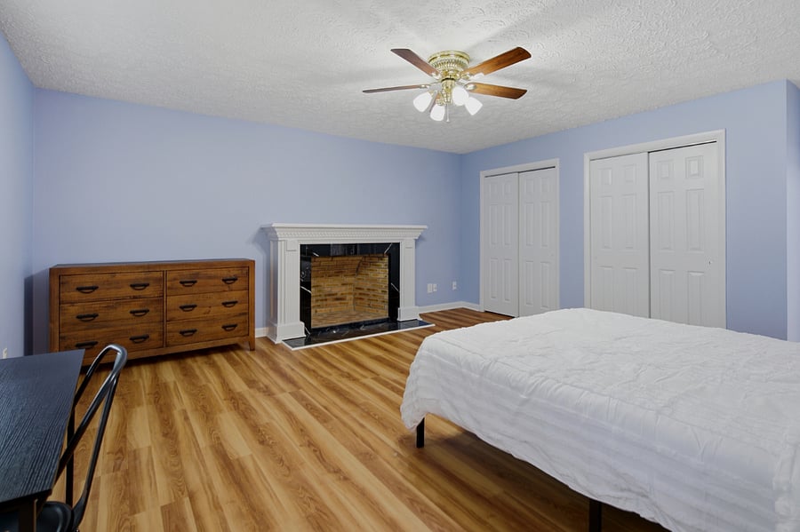 Decorative(nonfunctional) fireplace and double closets