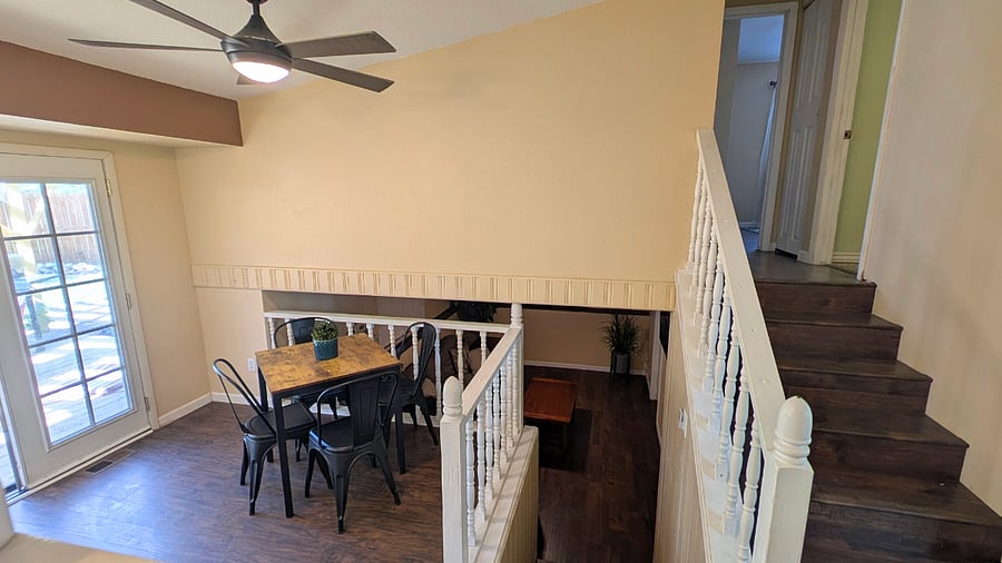 Dining room looking at split-level stairs